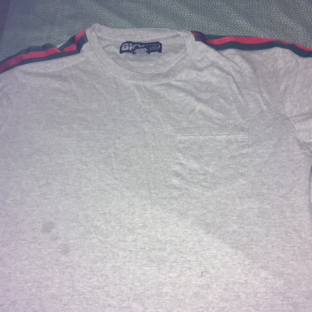 Grey shirt with green and red stripes